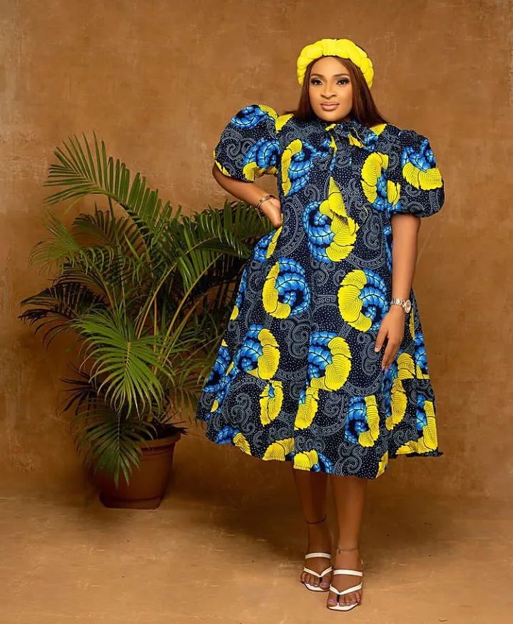 Short And Long Unique Ankara Gowns Styles 2022 12